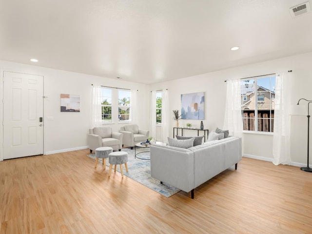 2303 S Bush Ave, Fresno, CA 93727 - living area with light wood-style floors and recessed lighting