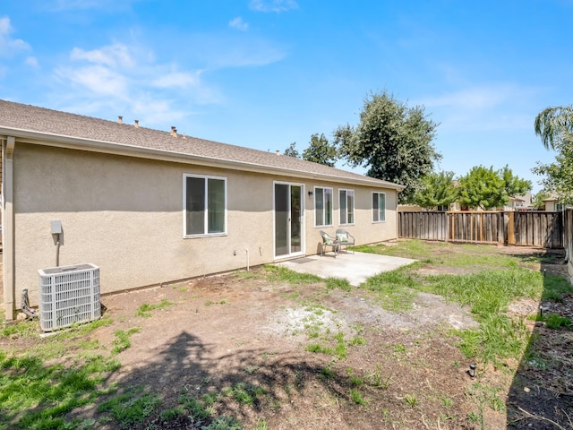 2303 S Bush Ave, Fresno, CA 93727 - back of house featuring a fenced backyard, a patio, and stucco siding