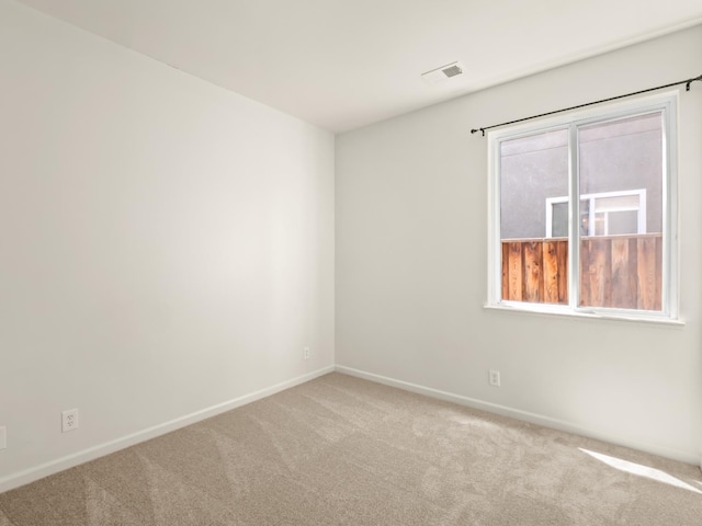 2303 S Bush Ave, Fresno, CA 93727 - empty room with carpet floors and baseboards