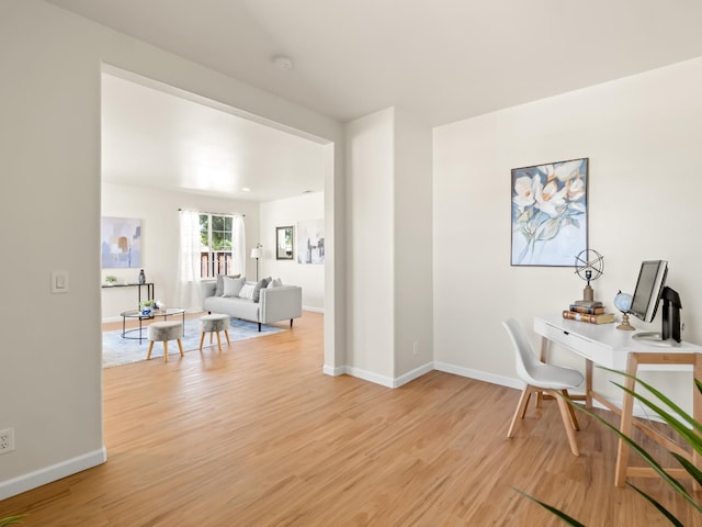 2303 S Bush Ave, Fresno, CA 93727 - office area featuring light wood-type flooring and baseboards
