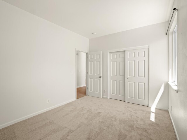 2303 S Bush Ave, Fresno, CA 93727 - unfurnished bedroom featuring carpet flooring and a closet