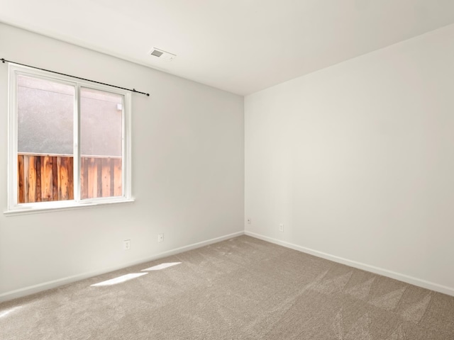 2303 S Bush Ave, Fresno, CA 93727 - spare room featuring carpet and baseboards