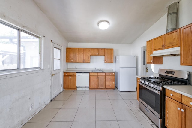 22 Beverly Dr, Clovis, CA 93612 - kitchen featuring white appliances, under cabinet range hood, lofted ceiling, light countertops, and brown cabinets