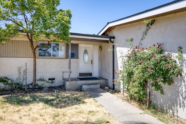 22 Beverly Dr, Clovis, CA 93612 - doorway to property with stucco siding