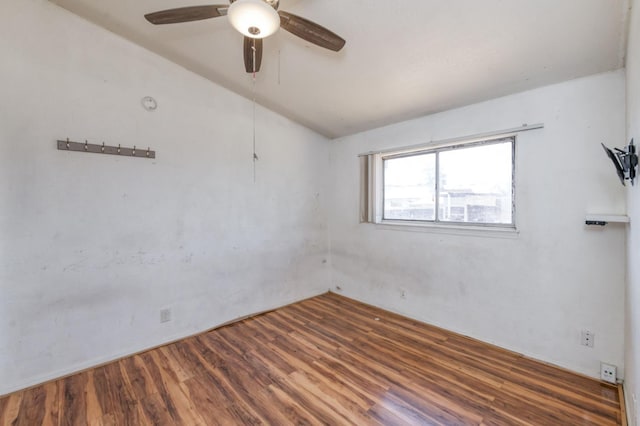 22 Beverly Dr, Clovis, CA 93612 - empty room featuring vaulted ceiling, a ceiling fan, and wood finished floors