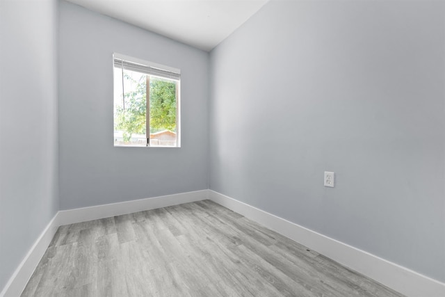 4014 E Olive Ave, Fresno, CA 93702 - unfurnished room with light wood-type flooring and baseboards