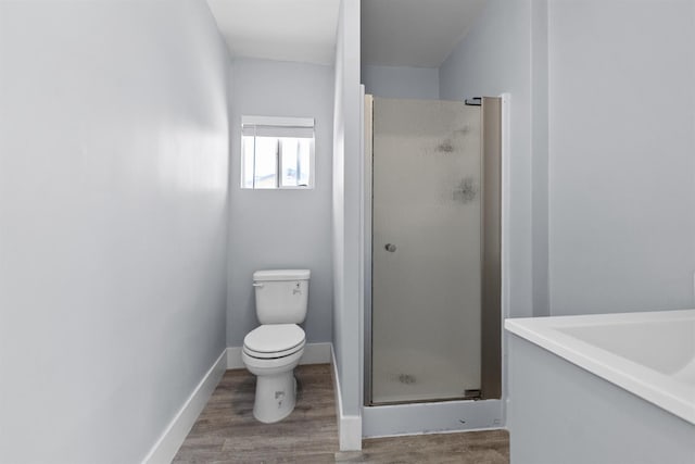 4014 E Olive Ave, Fresno, CA 93702 - full bathroom with a shower stall and wood finished floors
