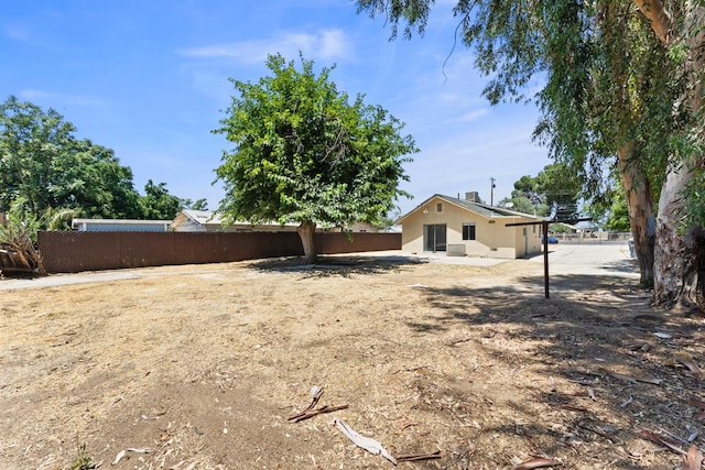 4014 E Olive Ave, Fresno, CA 93702 - back of property with a patio area and stucco siding