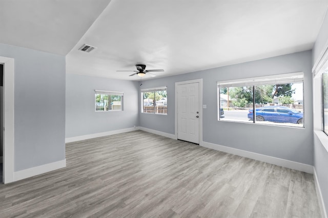 4014 E Olive Ave, Fresno, CA 93702 - spare room with wood finished floors and a ceiling fan