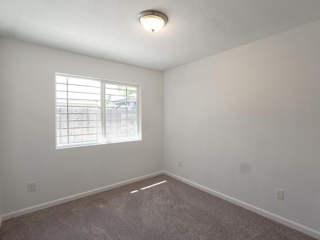 435 E San Pedro St, Merced, CA 95341 - carpeted empty room with baseboards