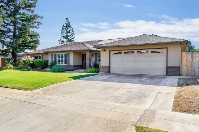 6658 N Thorne Ave, Fresno, CA 93711 - single story home featuring concrete driveway, stucco siding, an attached garage, and brick siding