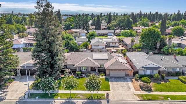 6658 N Thorne Ave, Fresno, CA 93711 - aerial perspective of suburban area with a mountainous background