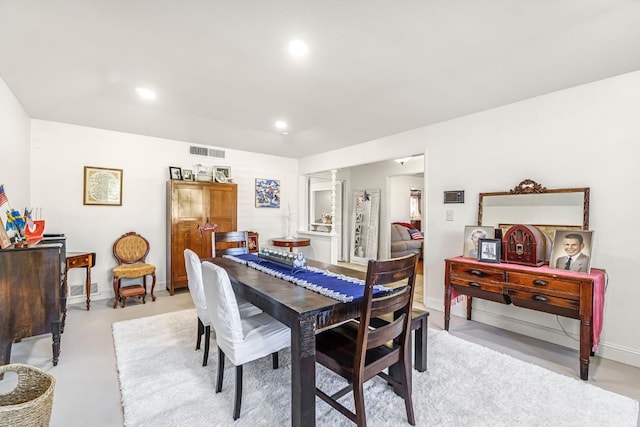 6658 N Thorne Ave, Fresno, CA 93711 - dining area with recessed lighting and concrete flooring