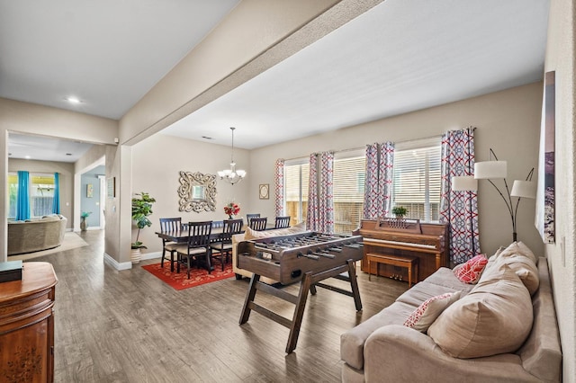2403 W Robin Ave, Visalia, CA 93291 - living room featuring wood finished floors, a chandelier, and recessed lighting