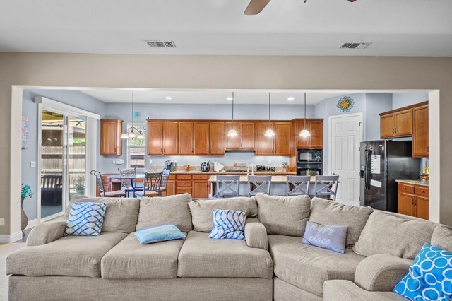 2403 W Robin Ave, Visalia, CA 93291 - living room with ceiling fan and recessed lighting