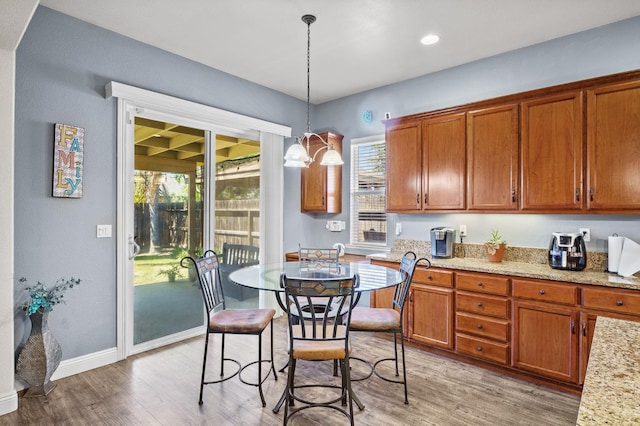 2403 W Robin Ave, Visalia, CA 93291 - dining room with light wood-style floors and baseboards