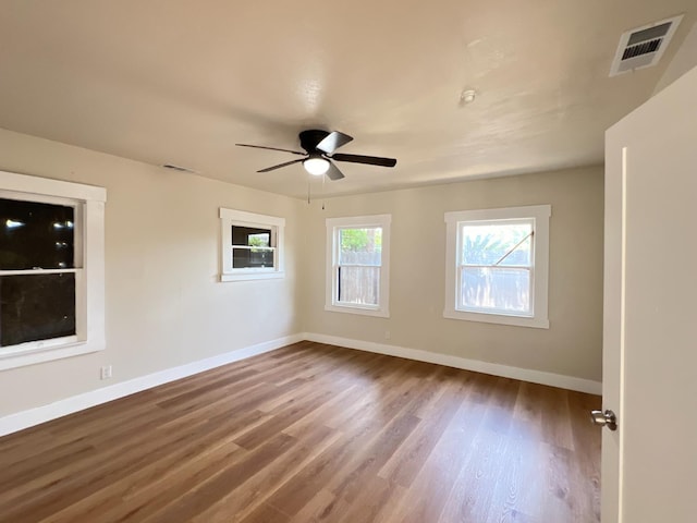 7013 N Maroa Ave, Pinedale, CA 93650 - empty room featuring wood finished floors and a ceiling fan