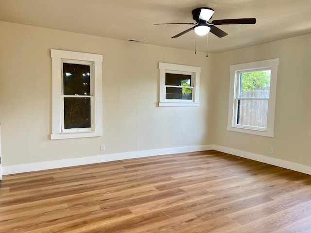 7013 N Maroa Ave, Pinedale, CA 93650 - spare room with light wood-type flooring and ceiling fan