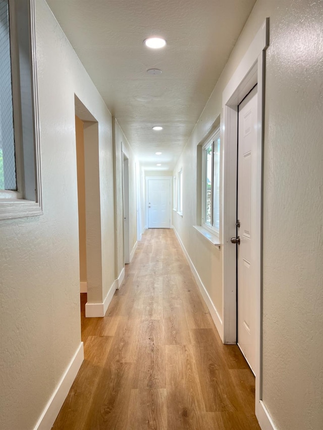 7013 N Maroa Ave, Pinedale, CA 93650 - hall featuring light wood-style flooring and recessed lighting