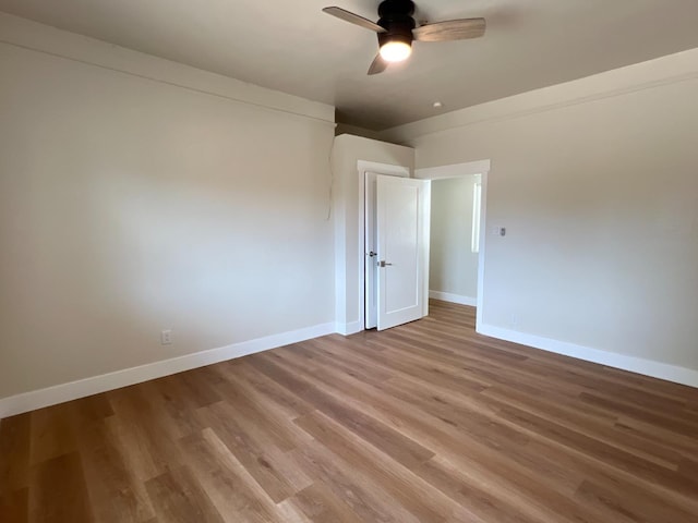 7013 N Maroa Ave, Pinedale, CA 93650 - empty room featuring light wood-type flooring and ceiling fan
