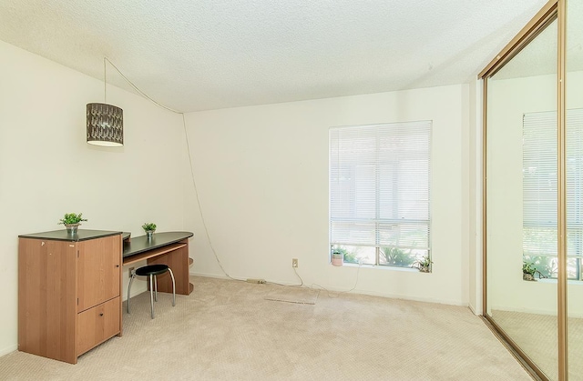 6338 N Maroa Ave Unit 115, Fresno, CA 93704 - unfurnished office featuring light colored carpet and baseboards