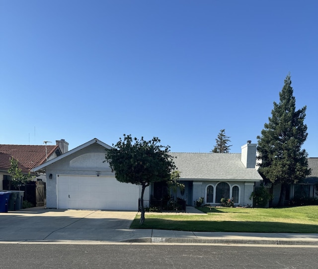 1723 Locust Ave, Clovis, CA 93611 - ranch-style house featuring a garage, driveway, a front lawn, a chimney, and stucco siding