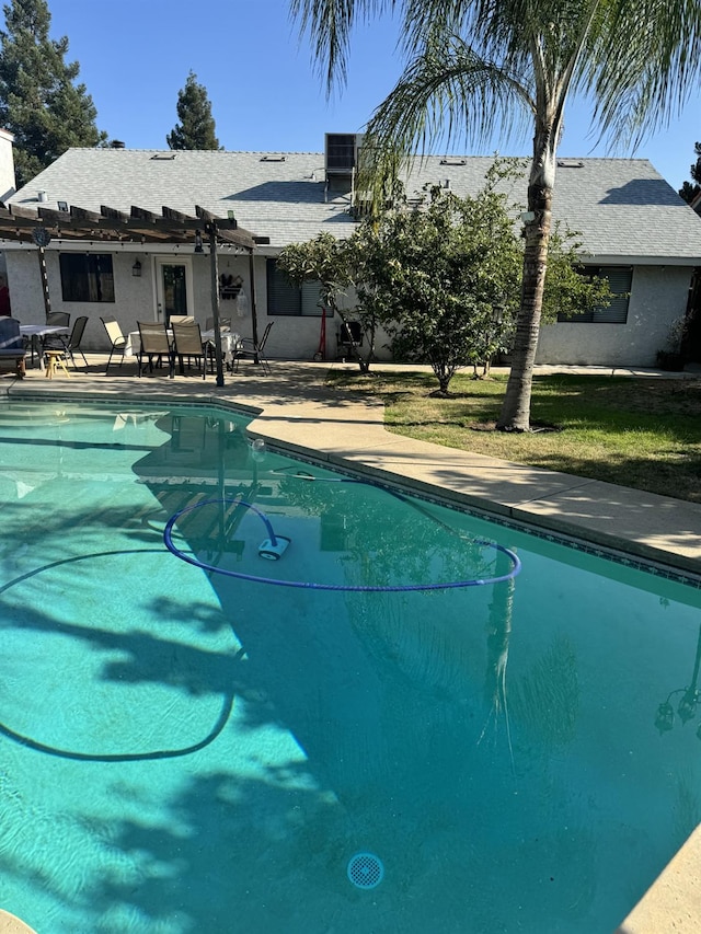 1723 Locust Ave, Clovis, CA 93611 - outdoor pool featuring a pergola and a patio area