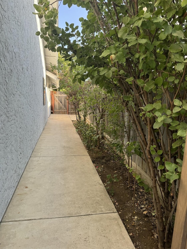 1723 Locust Ave, Clovis, CA 93611 - view of side of home featuring stucco siding