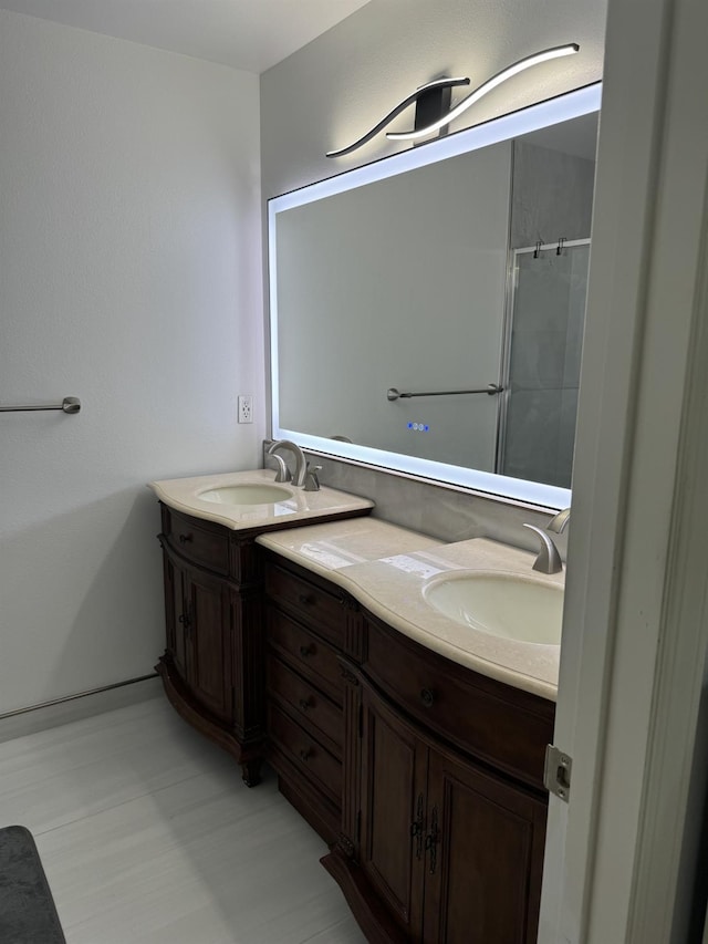 1723 Locust Ave, Clovis, CA 93611 - bathroom with double vanity and a shower