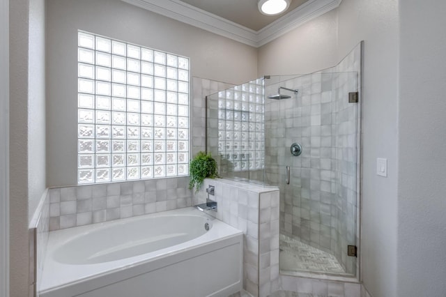 4994 W Minarets Ave, Fresno, CA 93722 - bathroom featuring a garden tub, a shower stall, and crown molding