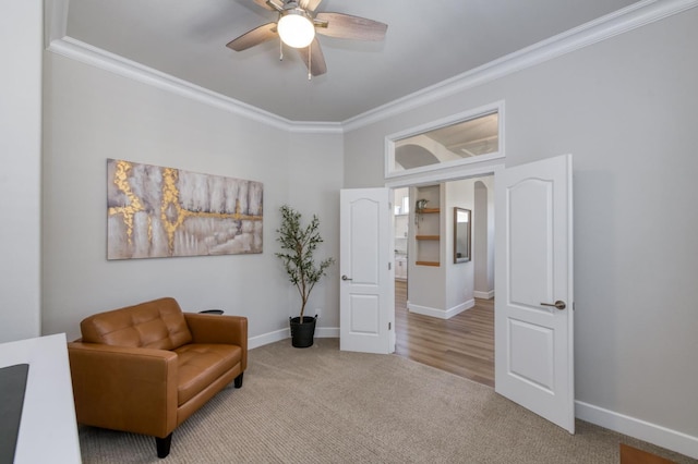 4994 W Minarets Ave, Fresno, CA 93722 - sitting room featuring ornamental molding, carpet, a ceiling fan, arched walkways, and a high ceiling