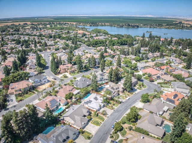 4994 W Minarets Ave, Fresno, CA 93722 - aerial view of property and surrounding area with nearby suburban area and a nearby body of water