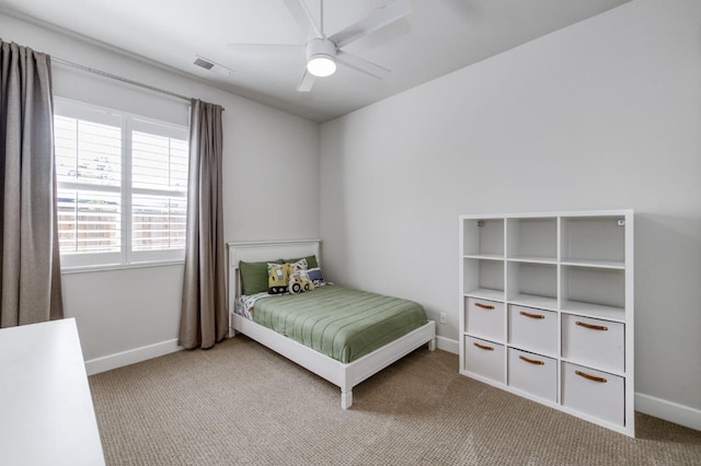 4994 W Minarets Ave, Fresno, CA 93722 - carpeted bedroom with baseboards and ceiling fan