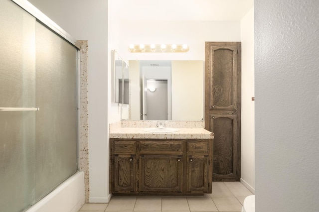 8298 N Calaveras St, Fresno, CA 93711 - bathroom with vanity, tile patterned floors, and shower / bath combination with glass door