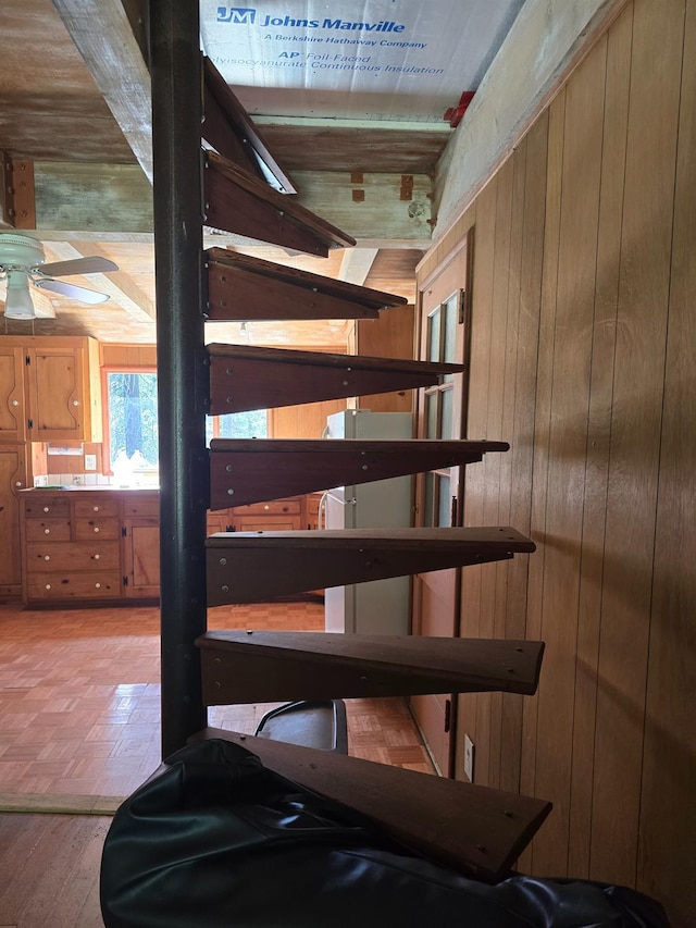 83703 Hazel, Wilsonia, CA 93633 - stairway with wood walls and ceiling fan