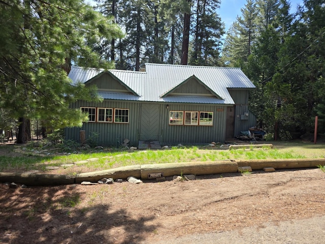 83703 Hazel, Wilsonia, CA 93633 - view of front facade featuring board and batten siding and a metal roof