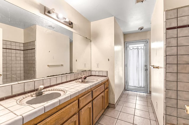 1401 S Villa Ave, Fresno, CA 93727 - bathroom with double vanity and tile patterned floors