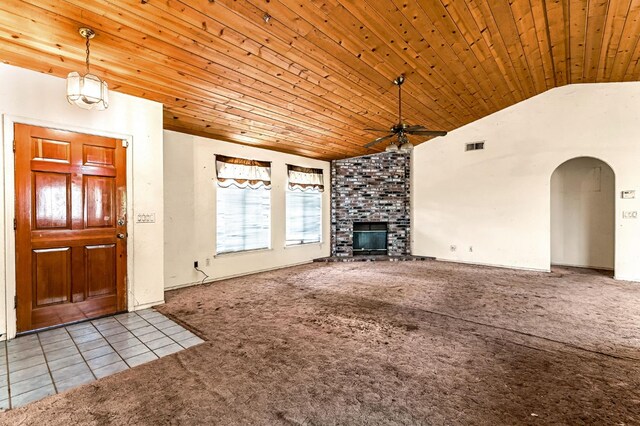 1401 S Villa Ave, Fresno, CA 93727 - unfurnished living room with ceiling fan, carpet flooring, wooden ceiling, arched walkways, and vaulted ceiling