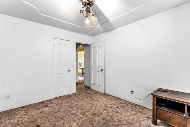 1401 S Villa Ave, Fresno, CA 93727 - unfurnished bedroom featuring carpet and arched walkways