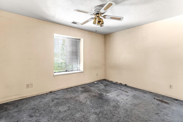 1401 S Villa Ave, Fresno, CA 93727 - spare room featuring a ceiling fan, carpet floors, and a textured ceiling
