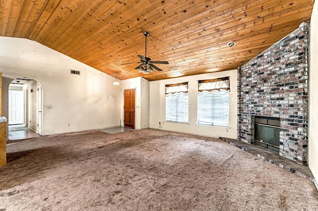 1401 S Villa Ave, Fresno, CA 93727 - unfurnished living room with arched walkways, wood ceiling, carpet floors, vaulted ceiling, and ceiling fan