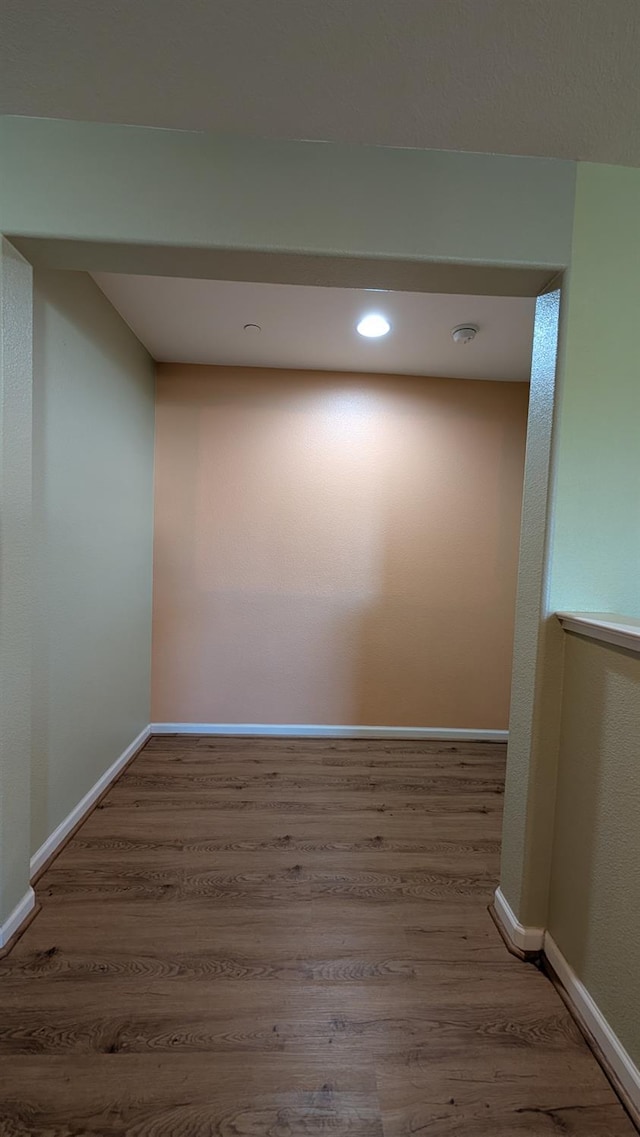 452 Rancho Mirage Rd, Madera, CA 93638 - empty room featuring wood finished floors, a smoke detector, and recessed lighting