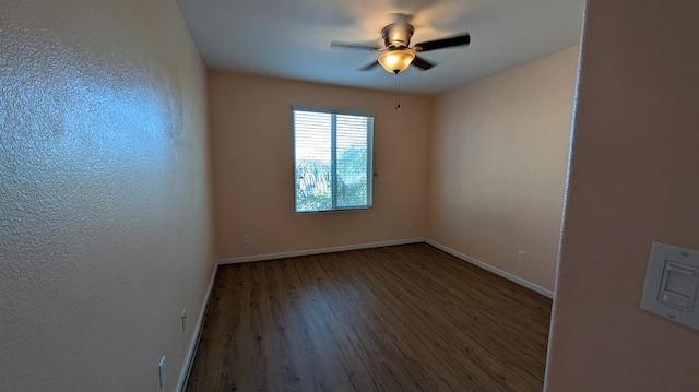 452 Rancho Mirage Rd, Madera, CA 93638 - empty room with wood finished floors and ceiling fan