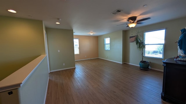 452 Rancho Mirage Rd, Madera, CA 93638 - empty room with wood finished floors, recessed lighting, and a ceiling fan