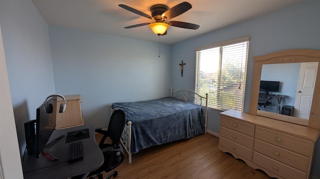 452 Rancho Mirage Rd, Madera, CA 93638 - bedroom featuring an office area, light wood finished floors, and ceiling fan