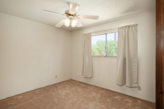 4835 E Normal Ave, Fresno, CA 93703 - unfurnished room featuring carpet flooring, a ceiling fan, and a textured ceiling
