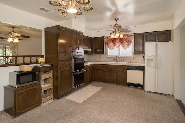 4835 E Normal Ave, Fresno, CA 93703 - kitchen with white appliances, a ceiling fan, dark brown cabinets, and backsplash