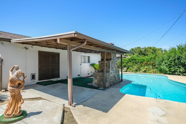 4835 E Normal Ave, Fresno, CA 93703 - swimming pool featuring a patio area