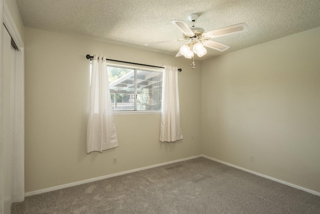 4835 E Normal Ave, Fresno, CA 93703 - carpeted spare room with a textured ceiling and ceiling fan