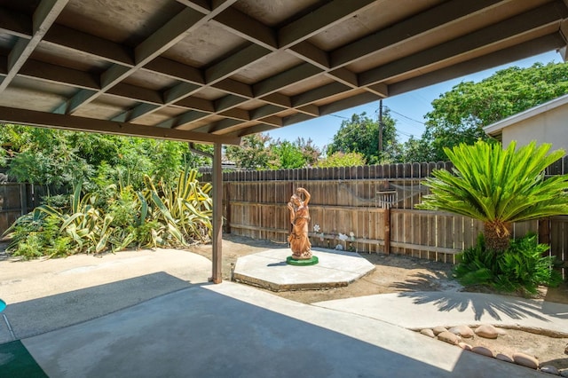 4835 E Normal Ave, Fresno, CA 93703 - fenced backyard with a patio